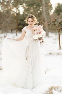 Winter Hochzeitskleid: Schneeshooting